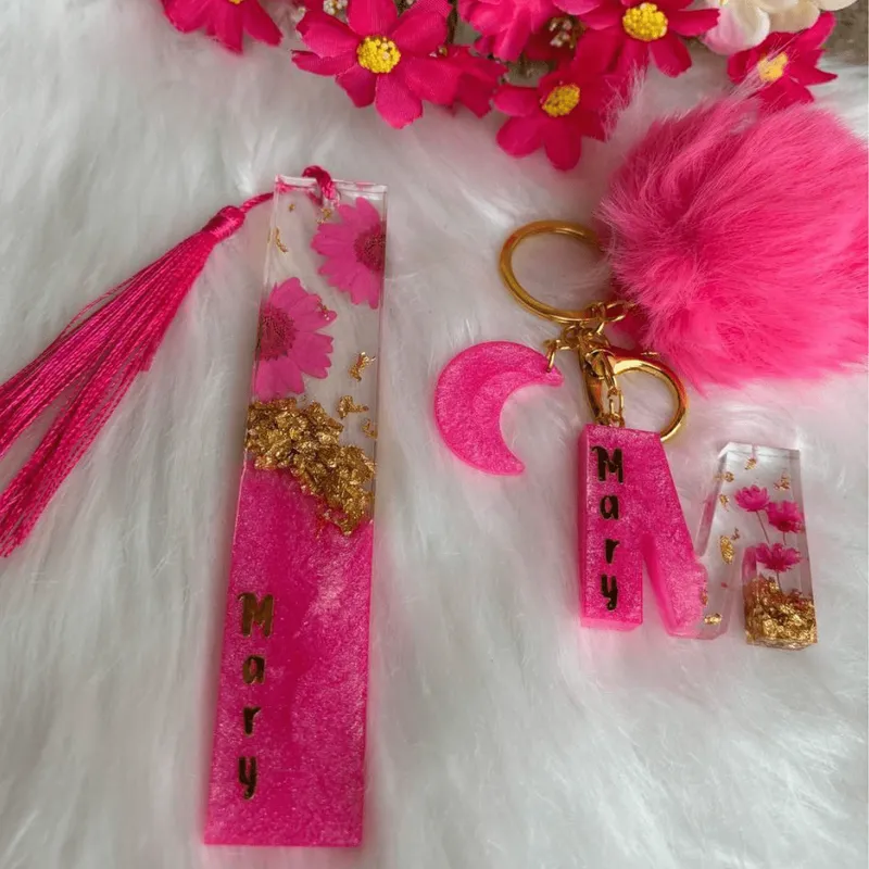 Llaveros de resina rosa con glitter